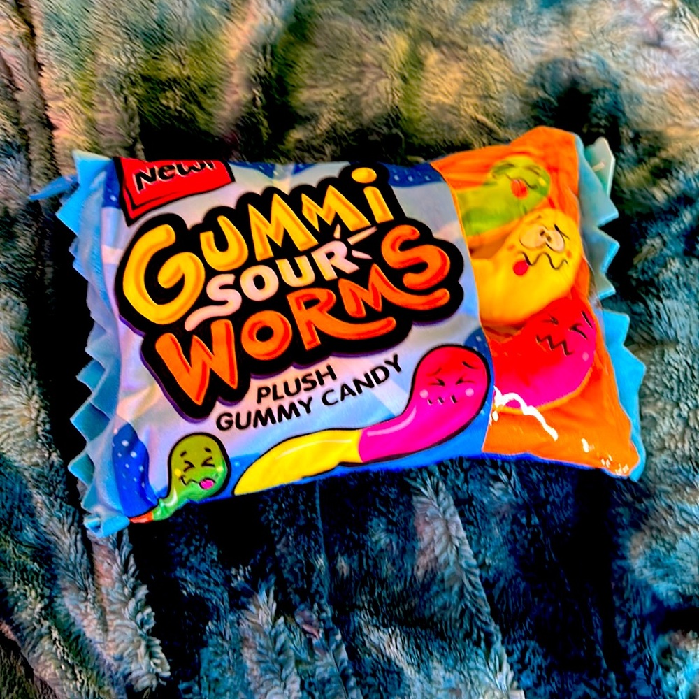 It’s a gummy sour worms pillow and you can take out the worms too